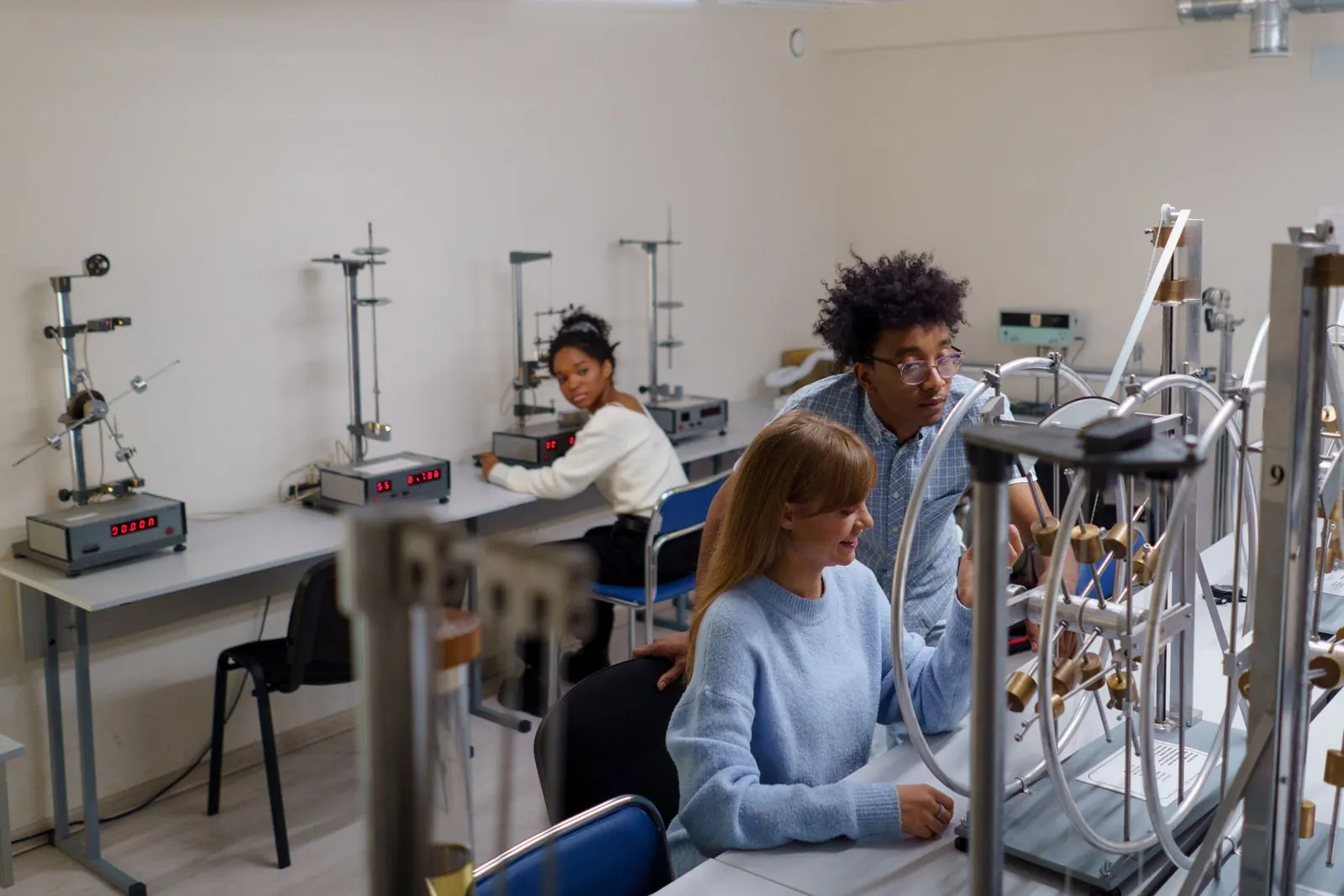 University students collaborating on a science experiment
